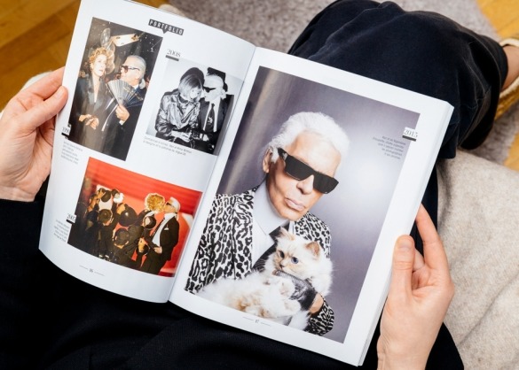 Magazine met foto van Choupette en Karl Lagerfeld